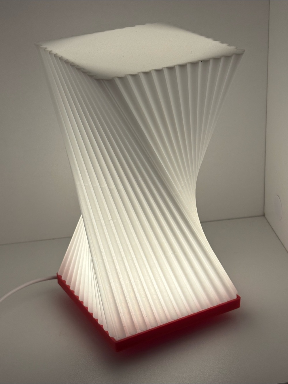 Modern White Sculptural Table Lamp with Red Base
